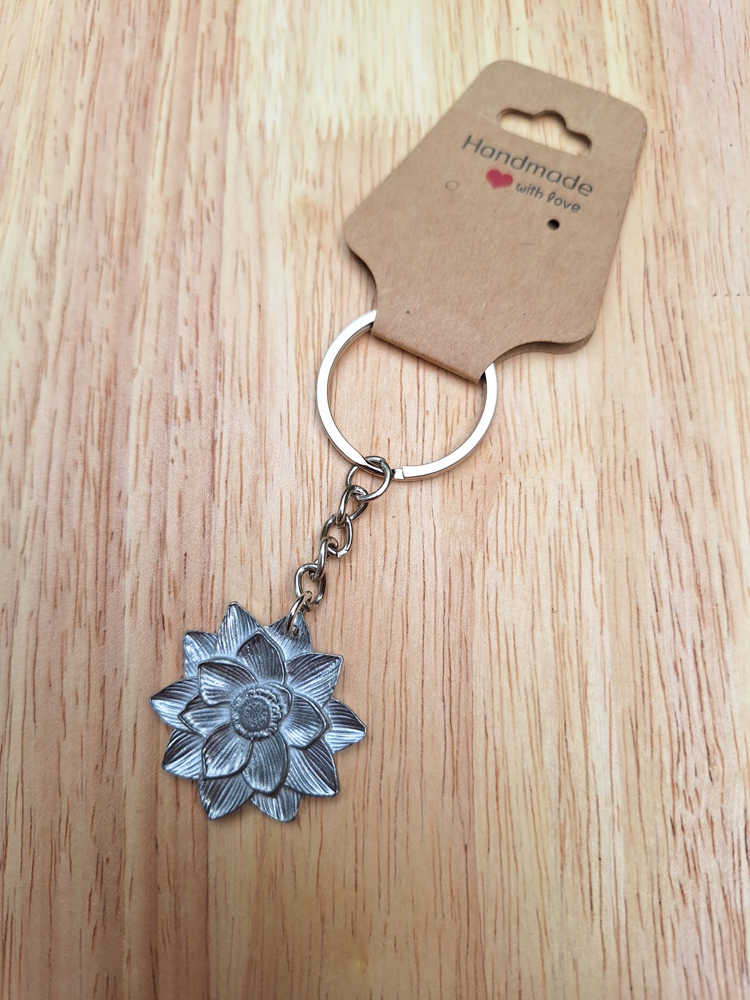 tinnenlotusbloemsleutelhanger